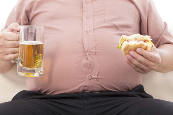 malbouffe, alcool et obésité comme causes de psoriasis sur les jambes